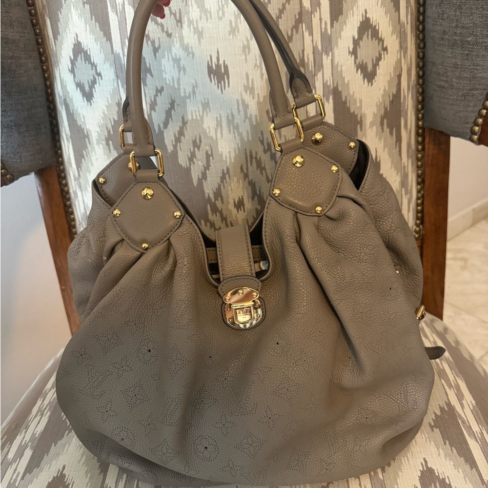 Louis Vuitton Tan Shoulder Bag with Structured Design and Gold Hardware